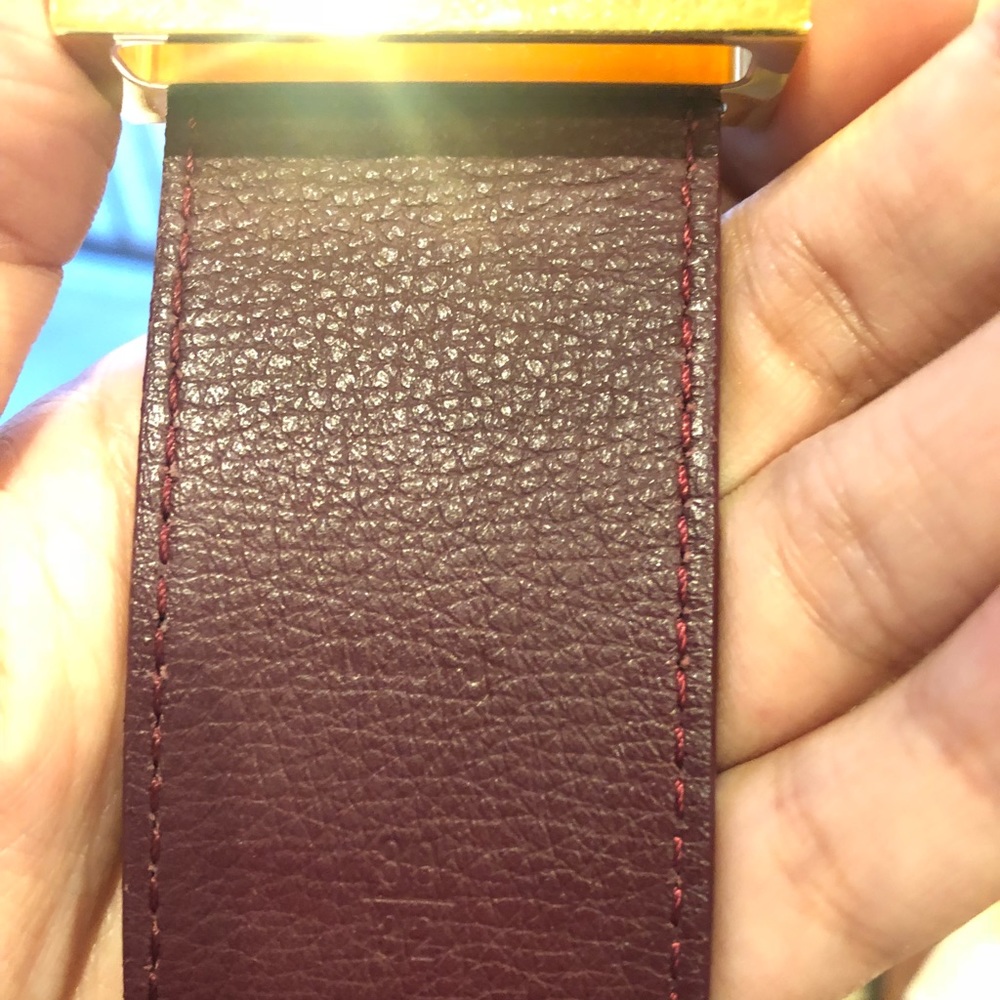 Louis Vuitton belt size 32 burgundy.